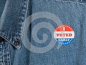 Blue denim working clothing with I Voted Early sticker