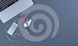 Blue desktop with mobile devices for telework or telecommute concept