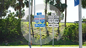 Blue directional road sign indicating direction to I-275 freeway interstate highway serving the Tampa Bay area in