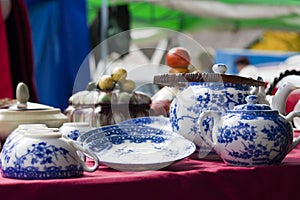 Blue dishware on flea market