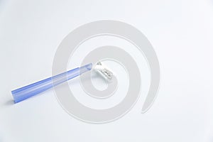Blue disposable razor on a white background