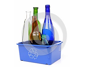 Blue disposal bin and color glass bottles