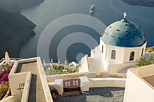 Blue dome church in Imerovigli village, photo taken in the morning