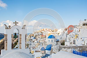 Blue dome church in Oia village, Santorini island, Greece