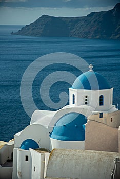 Blue dome church in Oia village, Santorini island, Greece