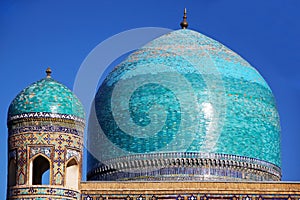 The blue dome of Tilya Kori Madrasah, Samarkand, Uzbekistan photo