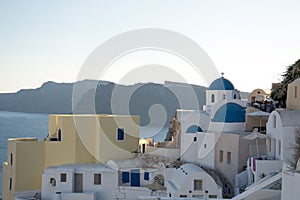Blue dome white church in Oia village, Santorini island, Greece