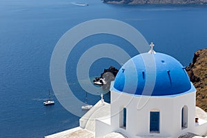 Blue domed churches on the Caldera at Oia on the Greek Island of