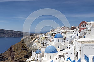 Blue domed churches on the Caldera at Oia on the Greek Island of