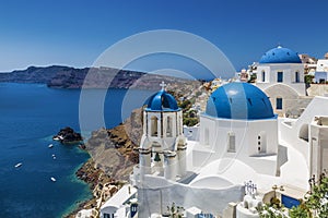 Blue domed churches in the village of Oia, Santorini Thira, Cyclades Islands, Aegean Sea,