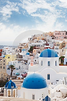 Blue domes of churches in Oia, Santorini, Greece.