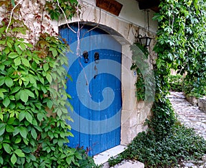 Blue door in an alley