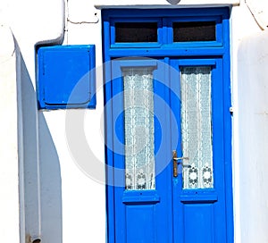 blue door in antique village santorini greece europe and white w