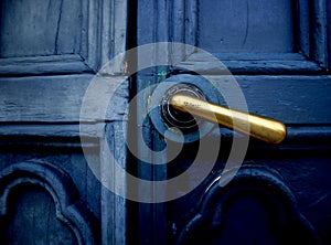 Blue door with brass handle