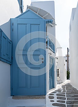 Blue door of a Cycladic architecture house on Mykonos Island, Greece