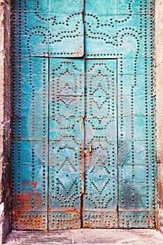 Blue door with decorative elements