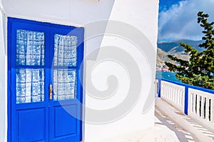 Blue door in front of Greek house, Greece
