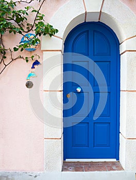 Blue door of Greek houses in the village on the island of Kefalonia in the Ionian Sea in Greece