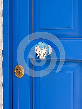 Blue door of Greek houses in the village on the island of Kefalonia in the Ionian Sea in Greece