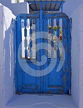 Blue door peeling paint