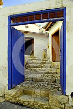 Blue door and stone steps in the old village of Laneia, Limassol district, Cyprus