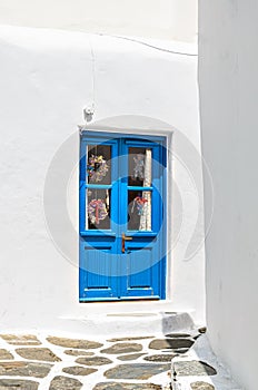 Blue door, typical of a house on the island of Myconos, Greece