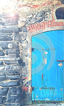 Blue door of a warehouse for boats
