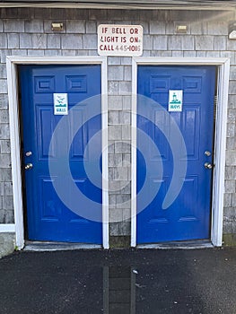 Blue doors, Buoys and Gulls Restroom signs