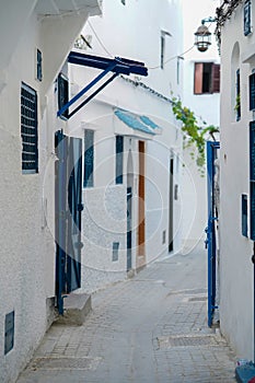Blue doors on the front of house in Tangier Morocco.