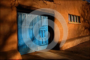 Blue Doors and Heavy Adobe Walls Santa Fe New Mexico photo