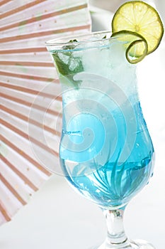 Blue drink cocktail with ice