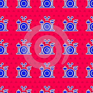 Blue Drums icon isolated seamless pattern on red background. Music sign. Musical instrument symbol. Vector