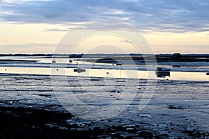 Blue dusk at West Mersea with boats on the estuary