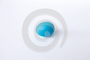 Blue easter egg isolated on white background
