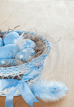 Blue easter eggs in basket