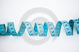 Blue easuring tape isolated on the white background