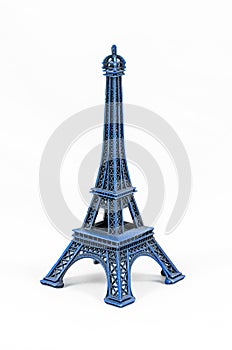 Blue Eiffel Tower model, isolated on white background