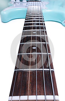 Blue electric guitar with big fretboard