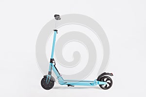 Blue electric kick scooter with seat on white background, side view