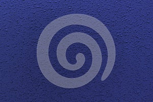 Blue embossed plastic surface. Abstract background or texture. Blank for design