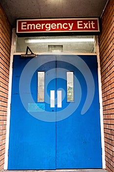 Blue Emergency Exit Doors From A Public Car Park With No People