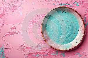 Blue empty plate on pink background, intermittent fasting concept.