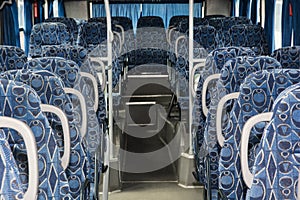 Blue empty seats in the bus