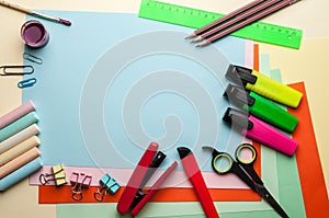 Blue empty sheet with stationery objects.