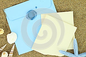 Blue envelope on the beach