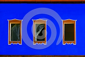 Blue exterior with three windows