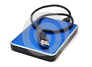 Blue external hard drive on white background