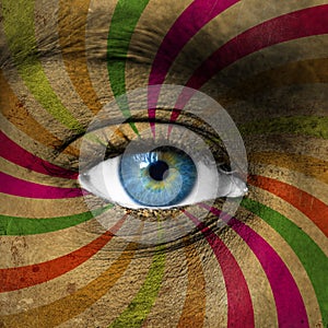 Blue eye and abstract colorful stripes