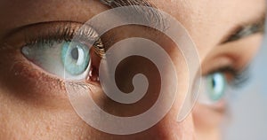 Blue eye focus, woman face zoom and eyes vision for a optometrist test of the retina. Light iris of a female with lash