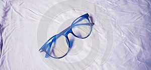 Blue Eye Glasses Isolated on White.